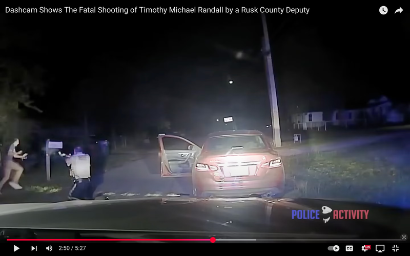 The-officer-fires-at-Randall-as-his-hands-are-up-in-the-air